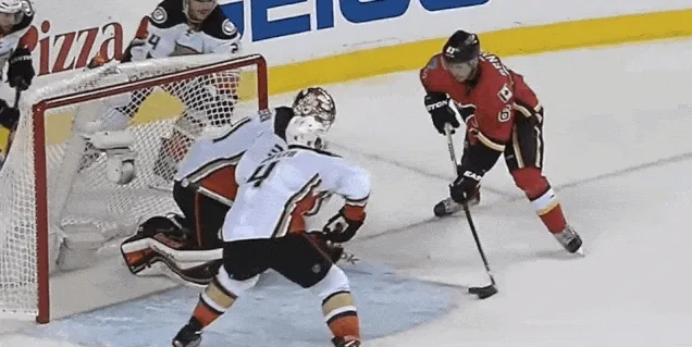 Hockey player taking a shot on goal