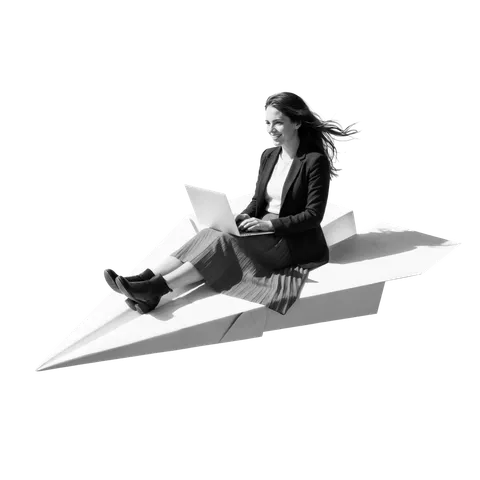 A salesperson working on a laptop while riding a paper airplane